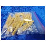25 vials of gold flakes