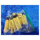 25 vials of gold flakes