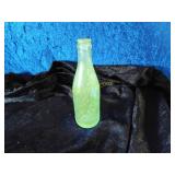 UV reactive Indianapolis Coca-Cola bottle glowing