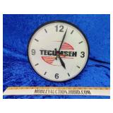 Tecumseh advertising clock battery powered