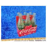 Original six-pack Coca-Cola cardboard with metal