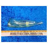 Melted Coke bottle hold your change by the