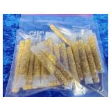 25 vials of gold flakes