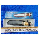 Hunting knife with leather sheath
