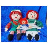 Raggedy Ann and Andy with child clean dolls