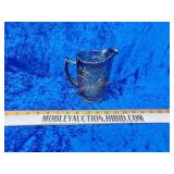 Carnival glass pitcher
