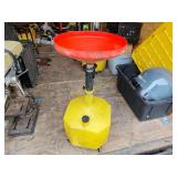 Oil drain for lifts on wheels