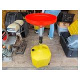 Oil drain for lifts on wheels