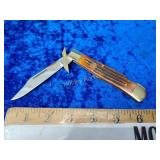 Leopard folding knife