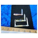 Three vintage carnival knives