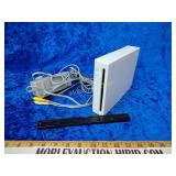 Nintendo Wii powered on soon as it plugs in light