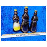 Three glass butter worth syrup bottles