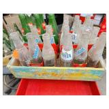Vintage 7up wooden crate with collectable bottles