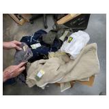 Large box full of new women's clothing shirts