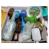 Box full old bottles