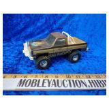 Vintage Ertl fall guy metal toy square body