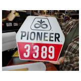 Vintage masonite pioneer sign