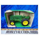 Vintage 1/16th Ertl John Deere model M tractor