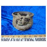 Unusual face pottery pot
