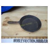 Cast iron pan marked with a d on the handle