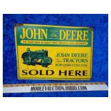 Embossed John Deere sold here sign