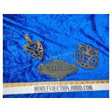 To cast iron pot holders and a welcome cast iron
