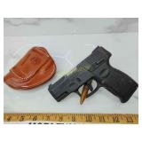 Taurus G2C 9 mm pistol with holster