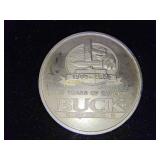 Commemorative buck knife coin