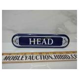 Porcelain head sign