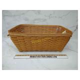 Large longaberger stow away basket with tags on