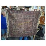 Hand woven rug from trips