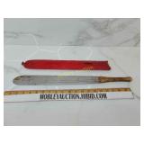 Sharp hatchet with hide sheath