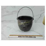 Cast iron gate marked cauldron