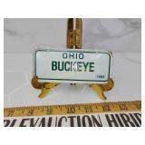 Vintage post cereal metal license plate
