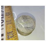 10x. 40% Kennedy silver half dollars