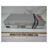VCR DVD player Phillips brand lights turned on