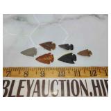 6 small arrowheads