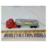 Tootsie toy semi original label partially on it