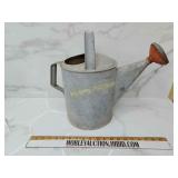 Vintage galvanized watering can