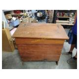 Antique feed bin needs bottom put back in
