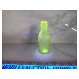 Antique walkers grape juice glows under black