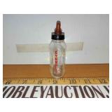 Evenflo to glass salesman sample bottle?