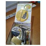 Cigar box with pocket knives and miscellaneous