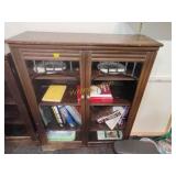 Antique glass door book shelf contents included