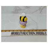 Salt and pepper shaker bee on a flower