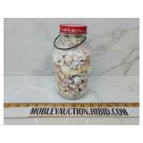 Old lipton jar full of shells