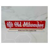 Embossed on Milwaukee metal beer sign