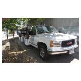 2000 GMC Flatbed Truck with Tommy Gate.