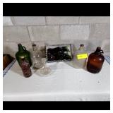 Glass Bottles and Candle Holder