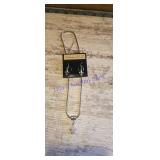 fleur-de-lis earrings and necklace